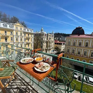 Balconies Above Colonnade Apartment